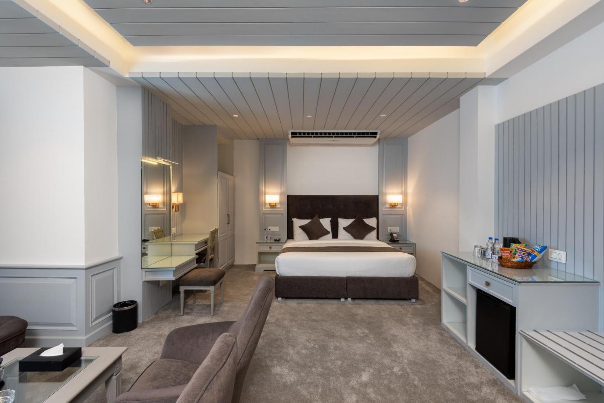 Hotel Grand Boulevard Durgjan Room photo